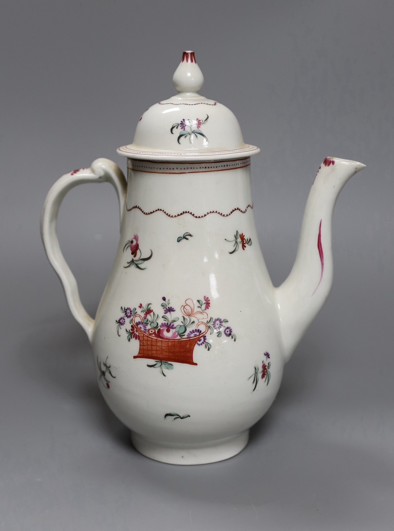 A Chinese export famille rose coffee pot and cover, circa 1800, 25 cms high